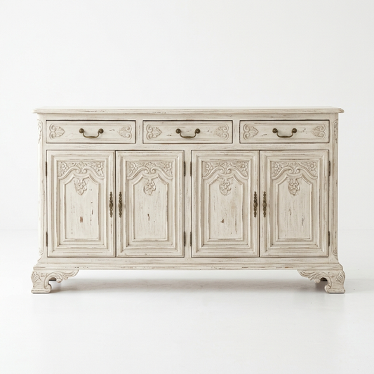 Distressed white French country sideboard on a white background